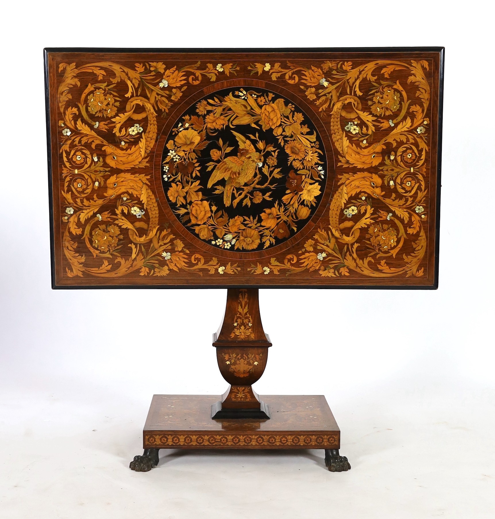 A 19th century Dutch walnut and marquetry tilt top centre table 117 x 72cm. Height 78cm.